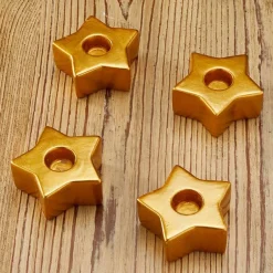 Set of 4 Star-Shaped Gold Taper Candleholders