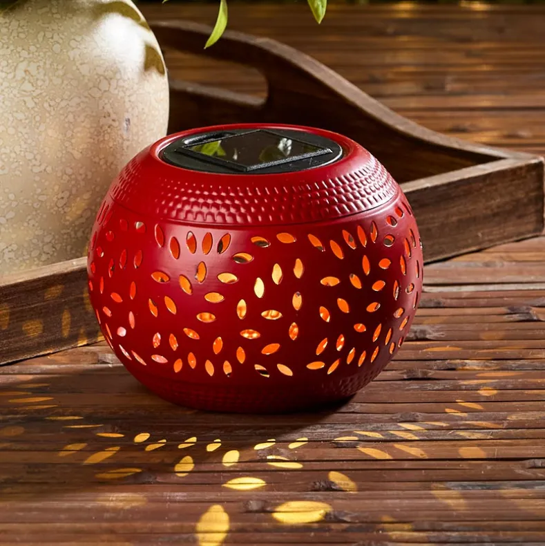 Solar Cutout Shadow Cast Round Table Lanterns